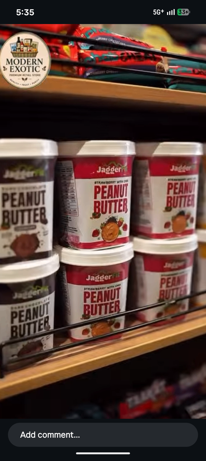JaggerFit peanut butter jars displayed under the Modern Exotic Foods shelf label
